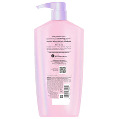 L'Oreal Paris Elvive displayed on bathroom shelf in a styled routine setting