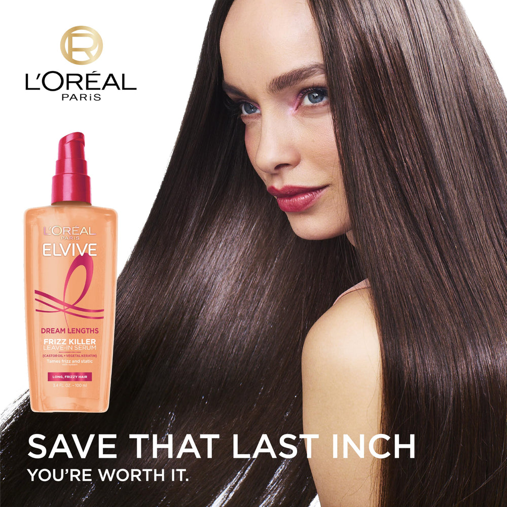 L'Oreal Paris clear serum texture on fingers showing lightweight slip