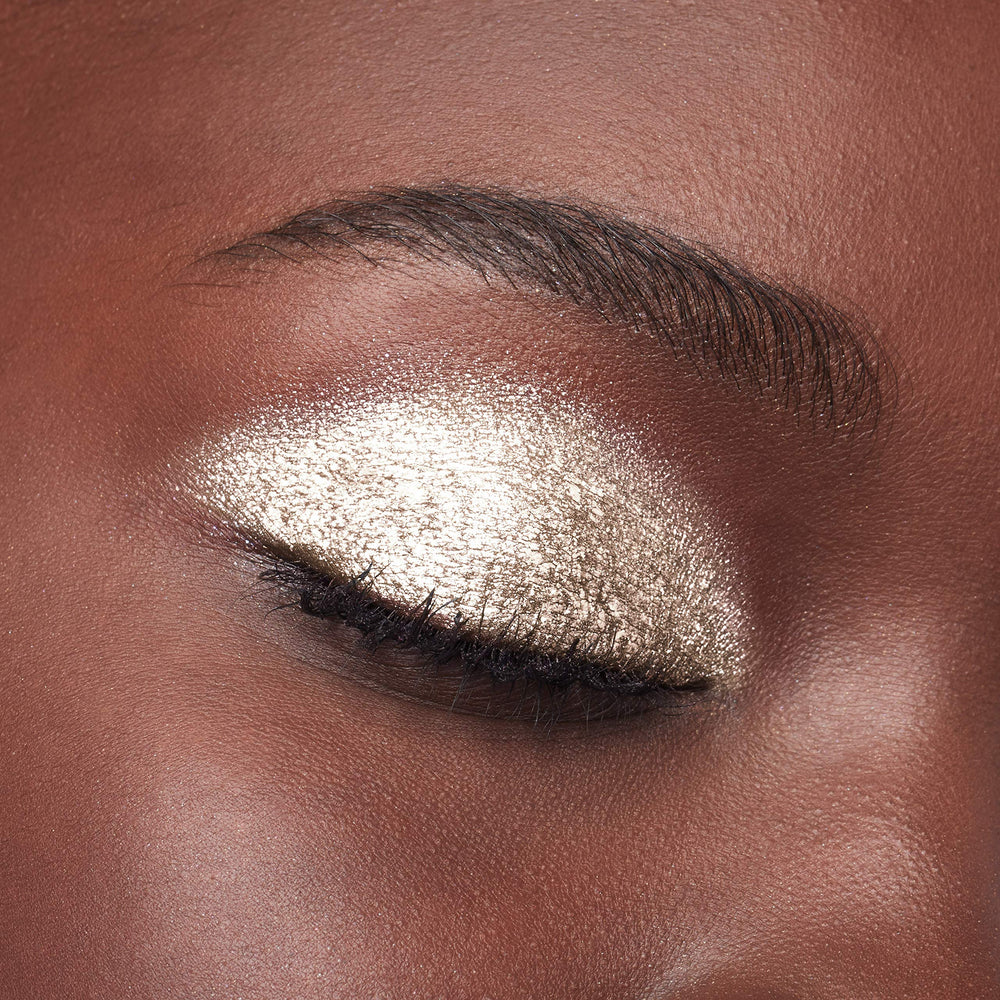 Makeup remover demo with pad dissolving L'Oreal Paris shimmer for gentle, effective removal
