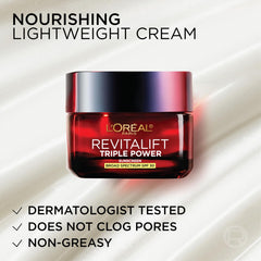 L'Oreal Paris product held in hand to show size and travel-friendly benefit