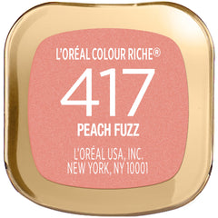 L'Oreal Paris size comparison in hand showing compact, travel-friendly benefit