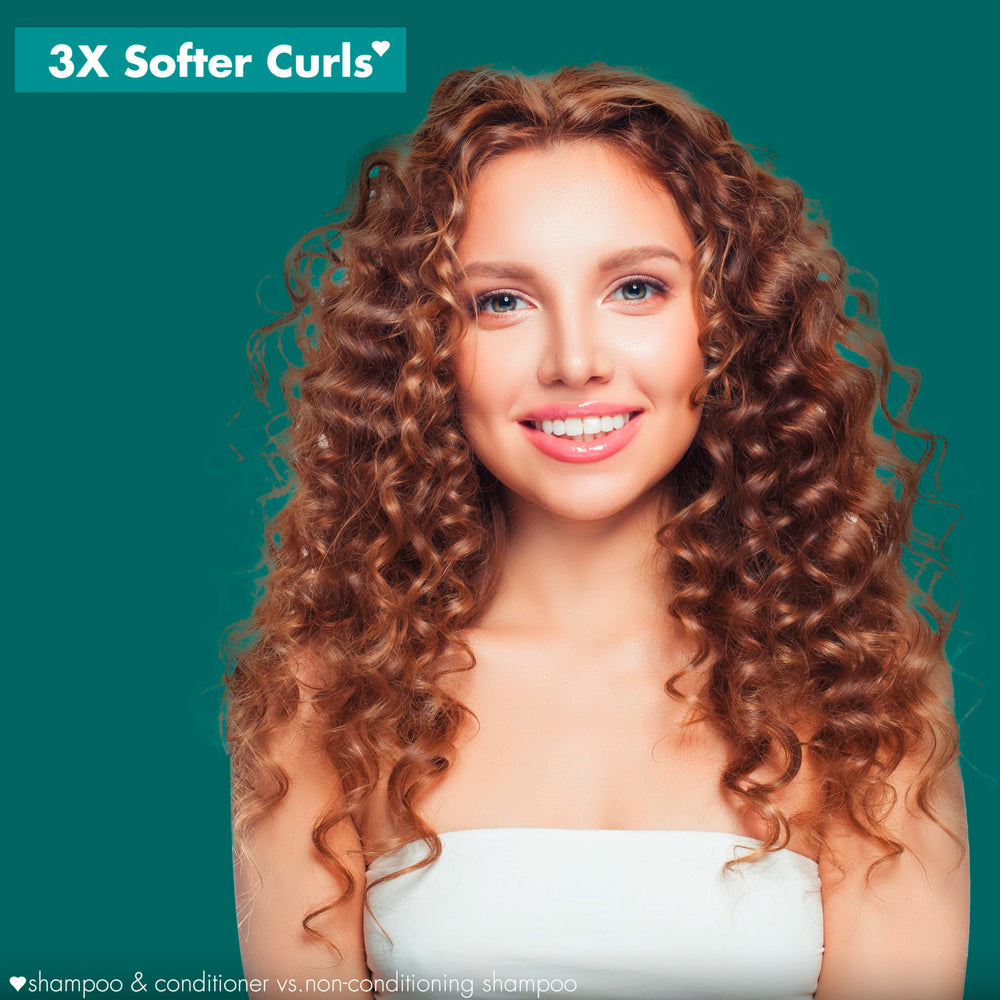 Love Beauty And Planet dispensing conditioner to show creamy texture and easy application