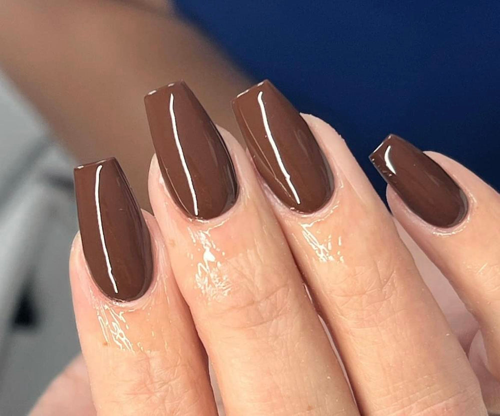 Love easy swatch nail strip closeup showing true brown tones and color payoff