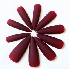 LoveOurHome lifestyle image at evening event showing bold matte burgundy style