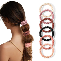 LOVUITEN scrunchie worn on wrist demonstrating comfortable carry and easy access