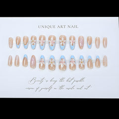 LPOODDNU hands applying a press-on nail for secure salon-style results