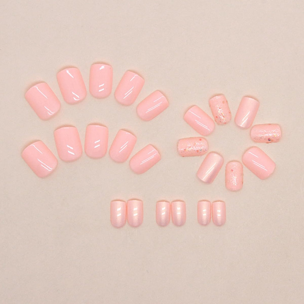 LRKNNO nails held in hand showing short square scale and practical length