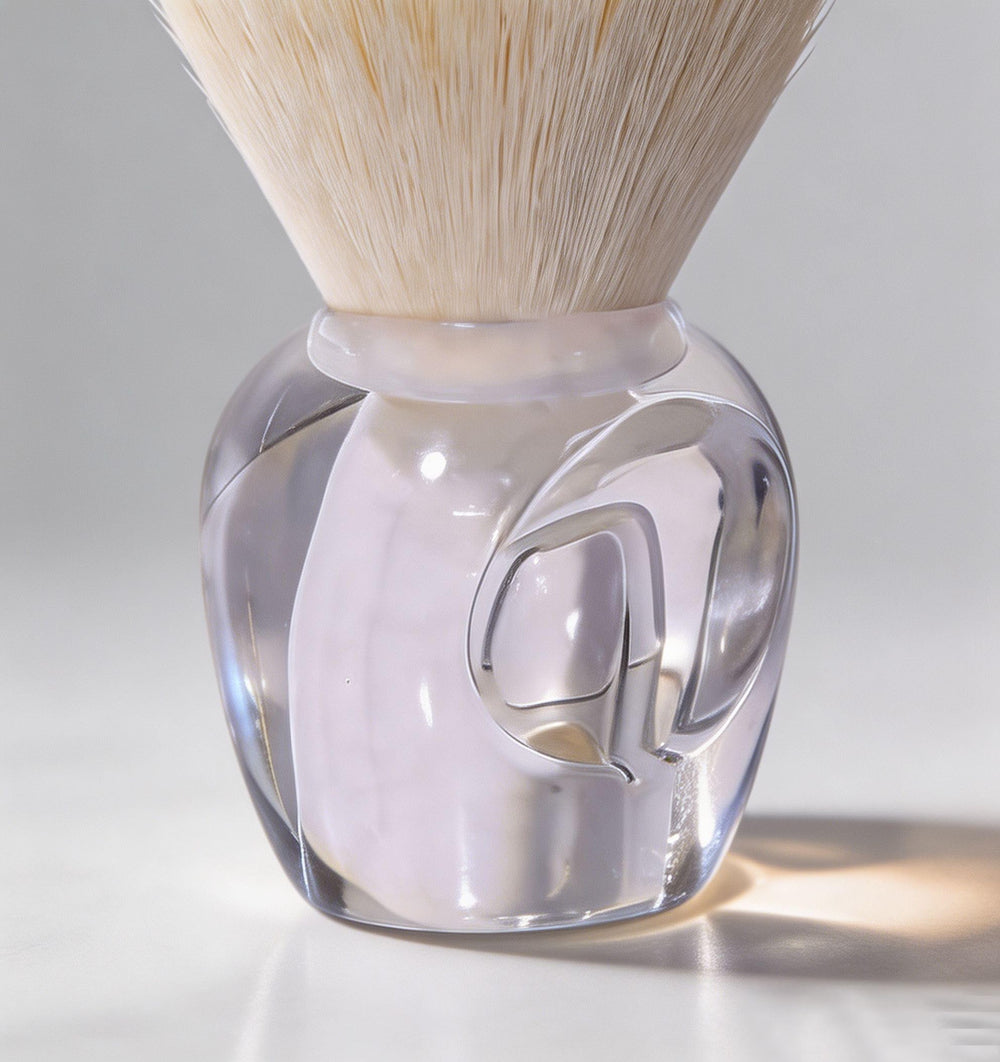 Lumcrissy brush next to fingers showing scale and travel-friendly portability