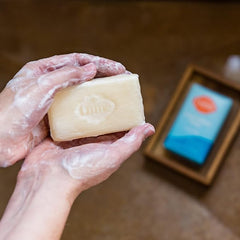 Lume bar used during shaving demonstrating smooth glide and comfortable shave