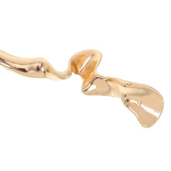 Lurrose stick inserted in a low bun demonstrating firm, elegant hold
