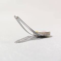 LUV HER clip beside a coin showing scale for accurate size and lightweight wear