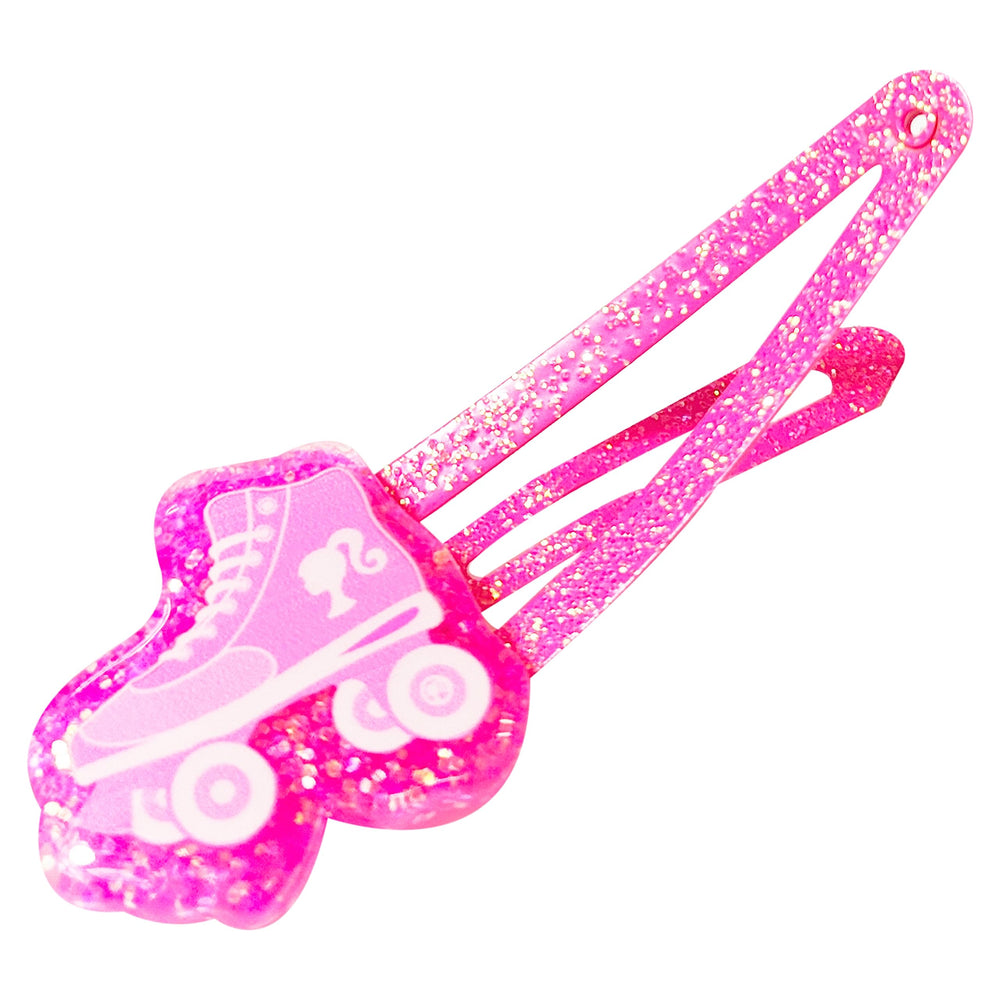 Child wearing multiple LUV HER Barbie clips, demonstrating secure stylish hold