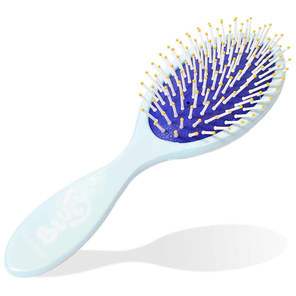 LUV HER Bluey brush in use on child showing gentle detangling and comfortable handling