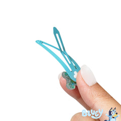 LUV HER clips in hand to show size and child-friendly scale benefit