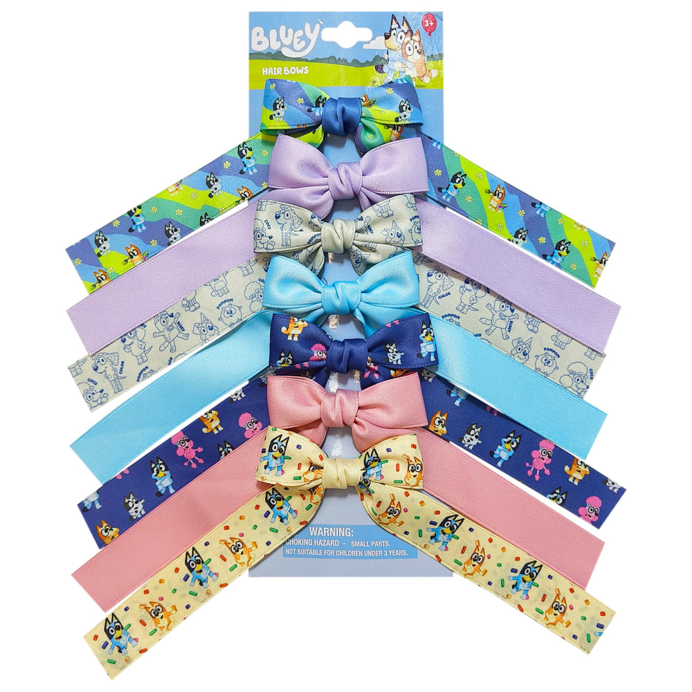 LUV HER smiling child wearing bow in casual setting conveying joyful wear