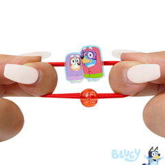 LUV HER hair ties in hand for size comparison, compact and travel-friendly