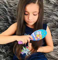 Luv Her rounded bristles closeup reducing pull and protecting scalp