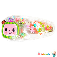 LUV HER Cocomelon lifestyle shot child smiling wearing clip for joyful look