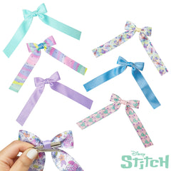 LUV HER bow held in hand to show real-world size and lightweight convenience