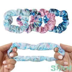 LUV HER scrunchies held in hand showing large size and secure gentle hold