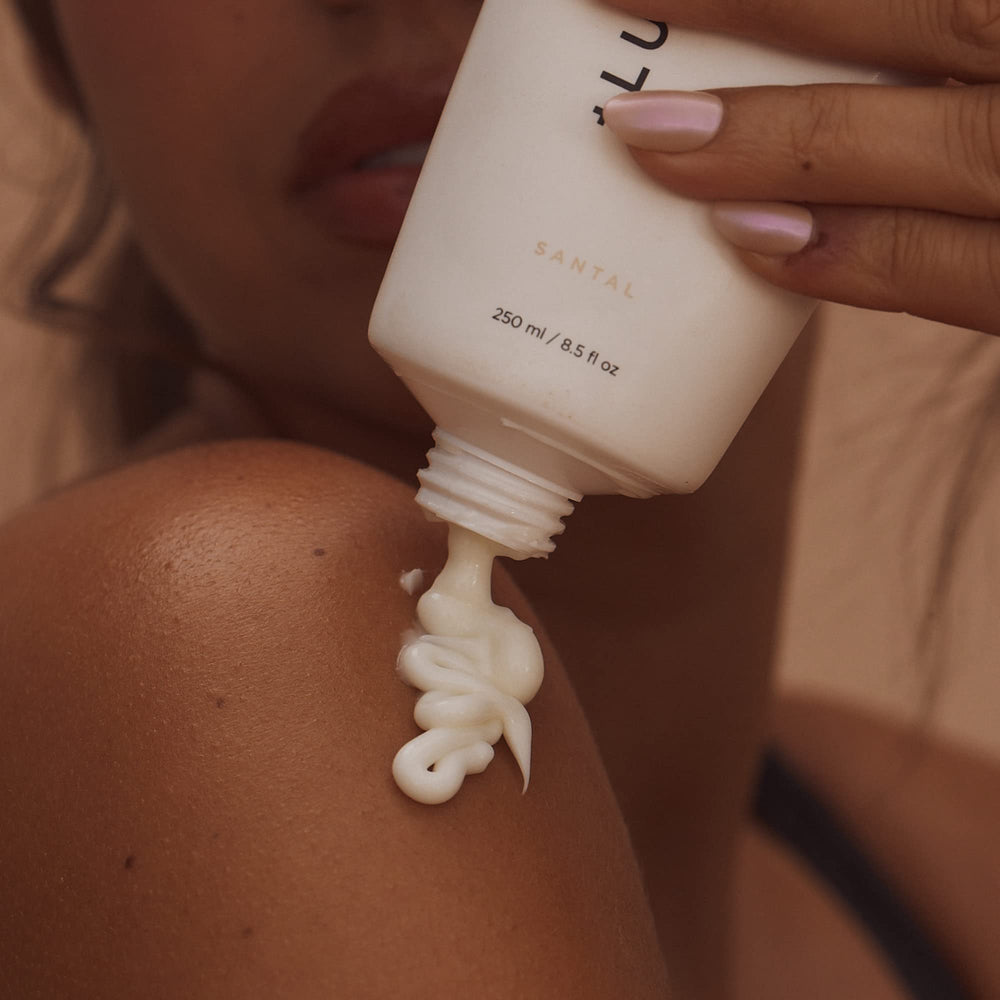 Lux Unfiltered lotion texture swipe showing creamy, fast-absorbing finish