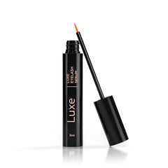 LUXE eyelash serum applicator detail with fine brush for precise lash-line application