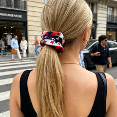 LYLYNB scrunchie held in hand for scale, shows compact travel-friendly size