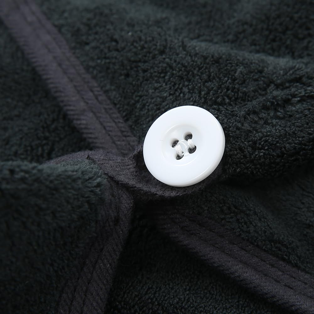 M-bestl towel next to ruler showing 25 x 65 cm size for fit clarity
