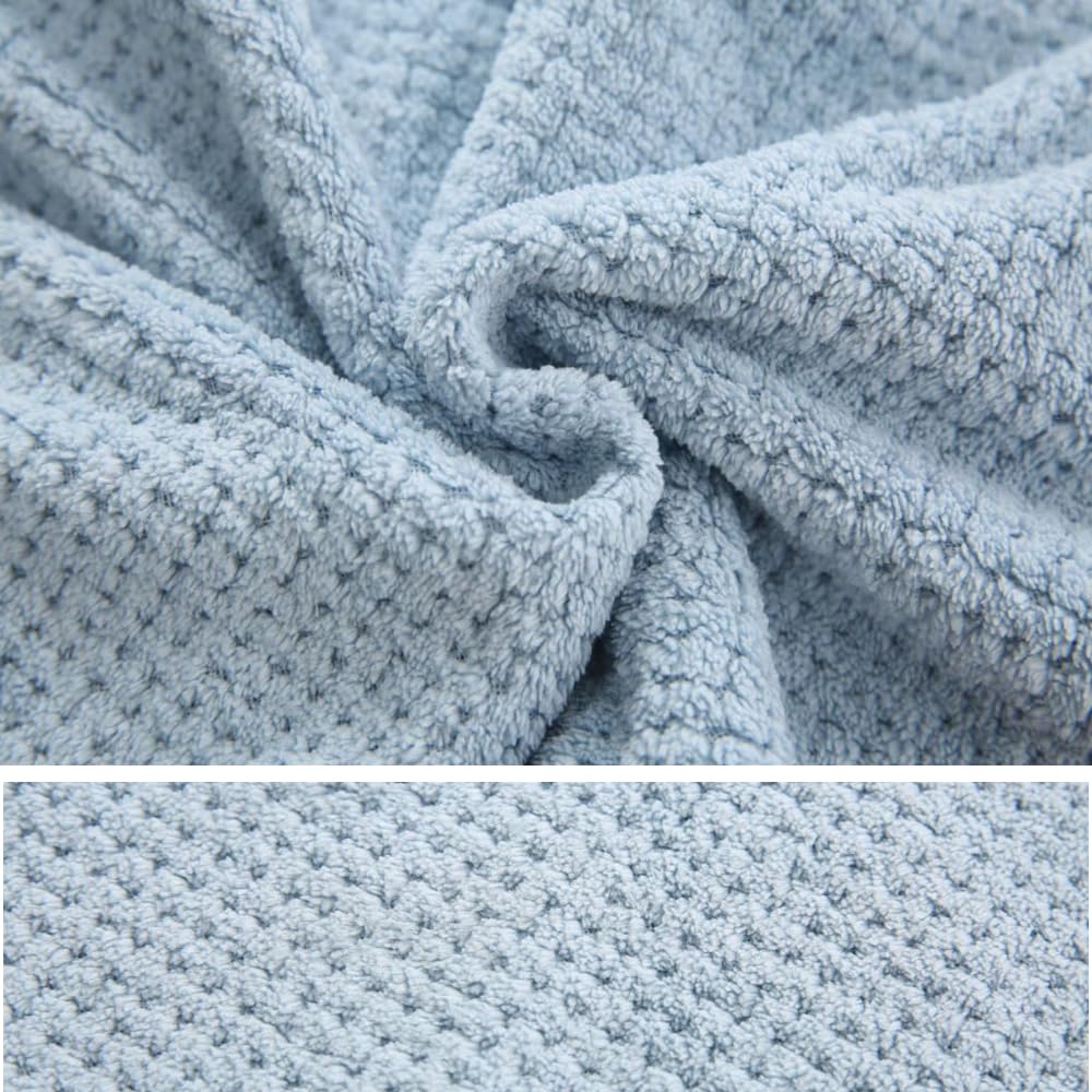 M-bestl towel next to ruler to show size and fit advantage