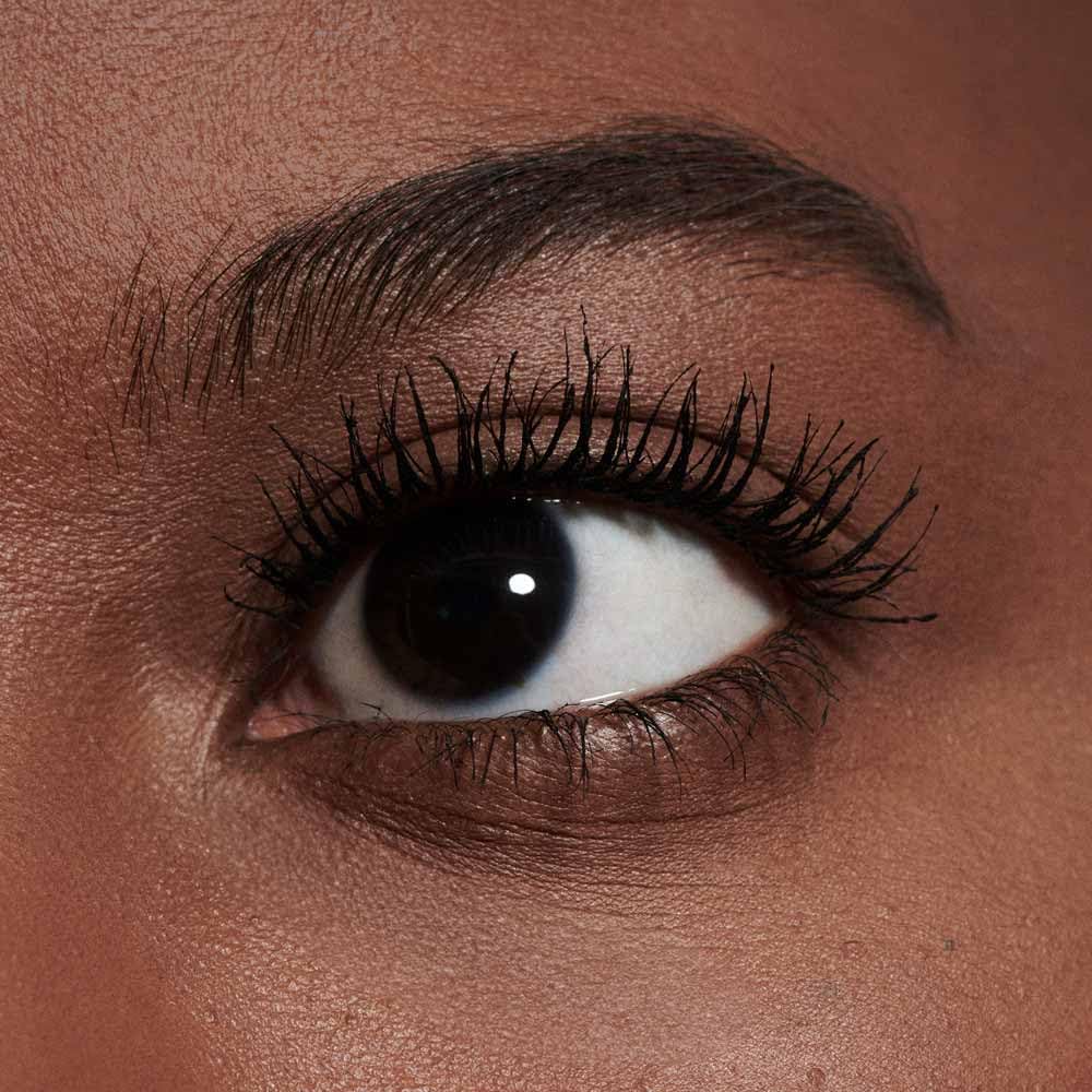 M·A·C application lifestyle shot showing easy on-the-go lash uplift