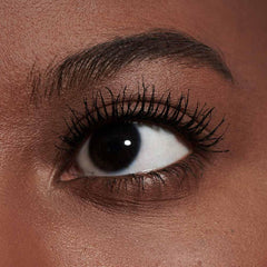 M·A·C application lifestyle shot showing easy on-the-go lash uplift