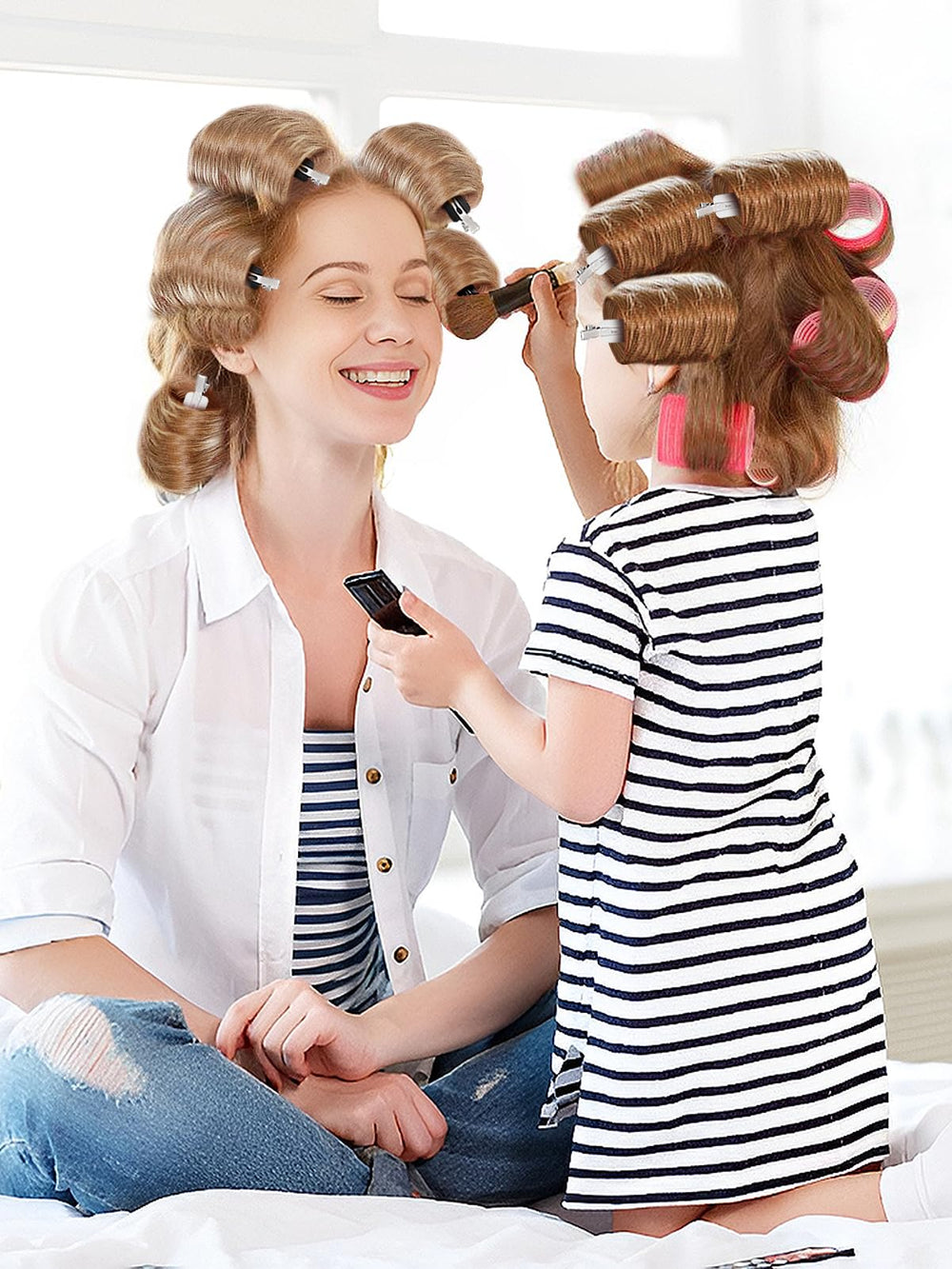 MADHOLLY clip holding bangs in place during styling, crease-free styling benefit