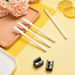 Maitys manual sharpener next to pencil to show size and easy maintenance