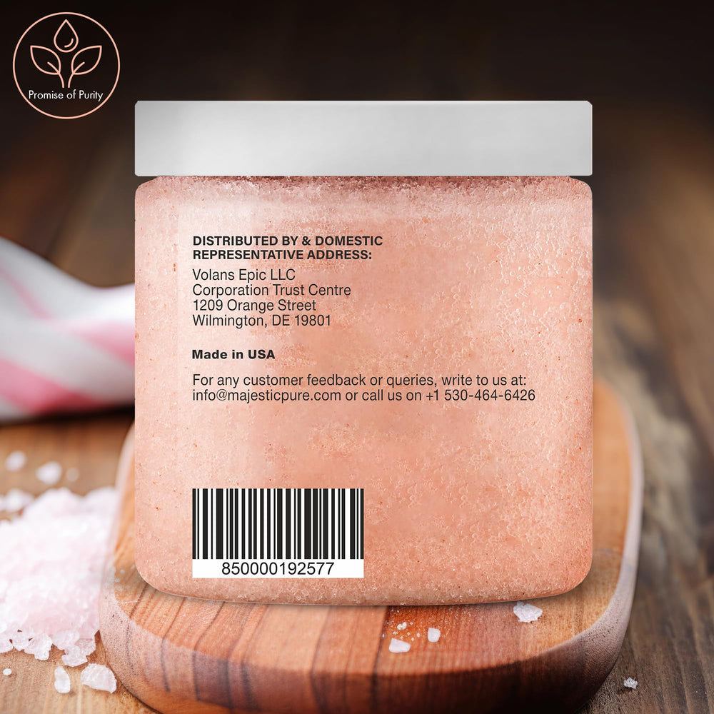 Majestic Pure tub next to coin showing 10 oz size scale