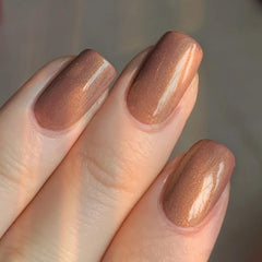 Major Dijit ochre swatch on hand illustrating true shade and coverage benefit