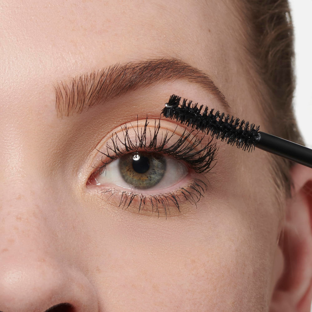 Makeup Revolution mascara texture swipe showing smooth, jet-black pigment