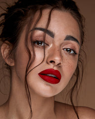 MAKI YIKA lip application illustrating even, transferproof coverage