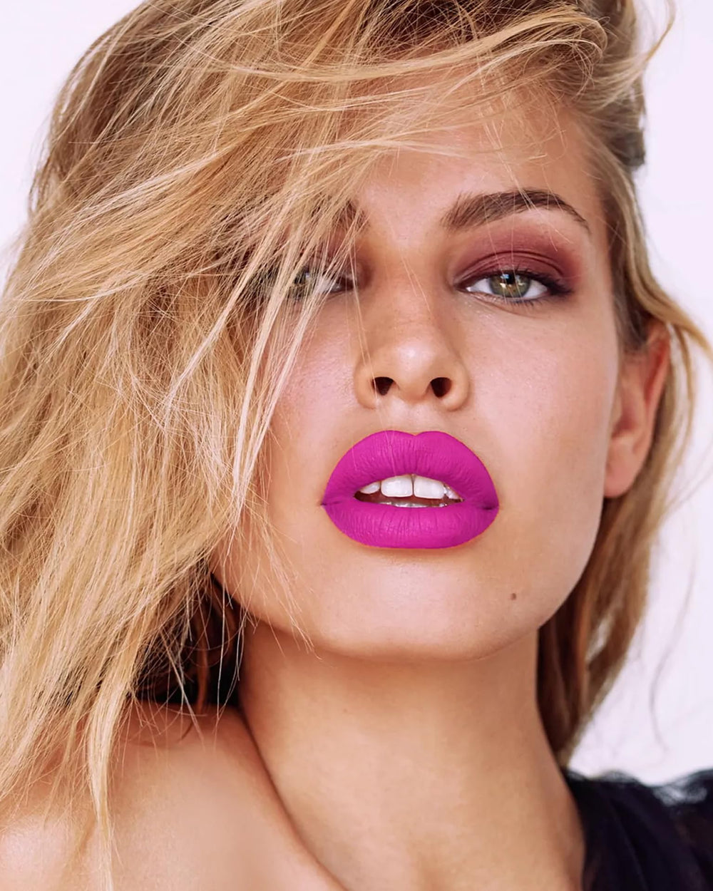 MAKI YIKA worn on lips full-face view highlighting vivid color and matte finish