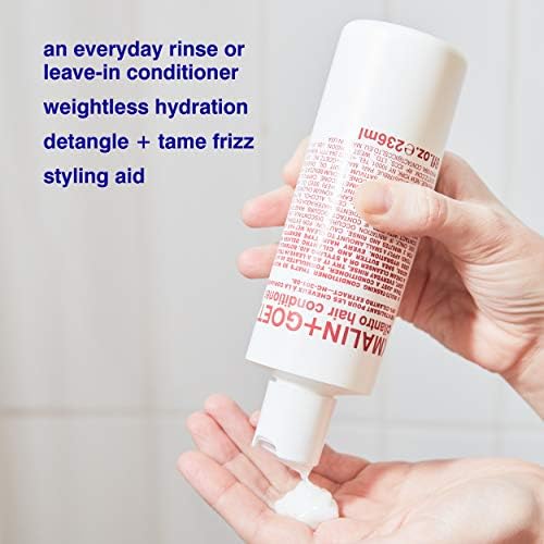 MALIN+GOETZ conditioner in use under shower showing easy detangling benefit