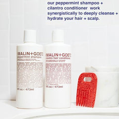 MALIN+GOETZ shampoo in bathroom lifestyle scene styled for modern, minimalist travel