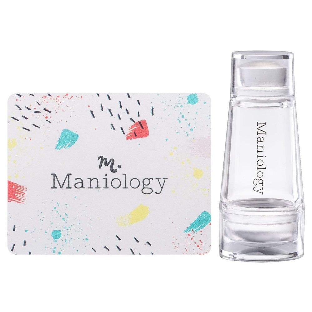 Maniology mini dual-ended stamper front view showing compact design and protective caps for clean storage