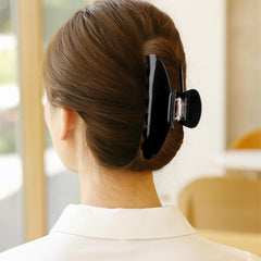 MAORULU clip securing a full bun showing strong grip for thick or long hair