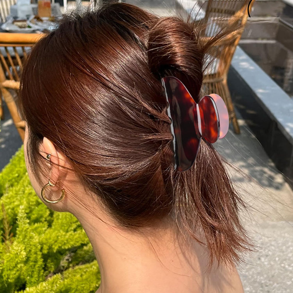 MAORULU holding a small bun and ponytail for neat, effortless styling