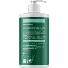 Maple Holistics tea tree droplet detail conveying scalp‑refreshing benefit