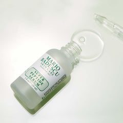 Evening skincare setup with Mario Badescu serum, suggests nightly routine boost