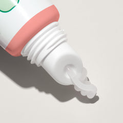 Mario Badescu lip balm held in hand to show 0.35 oz scale and travel-friendly size