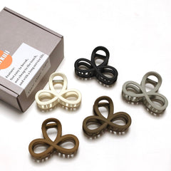 Markuii clip holding half-up hairstyle showing steady all-day hold