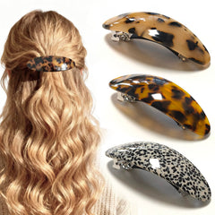 Markuii front view of three tortoise barrettes showing vintage style and reliable hold