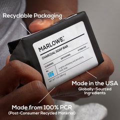 MARLOWE. soap held in hand to show 7 oz size and scale