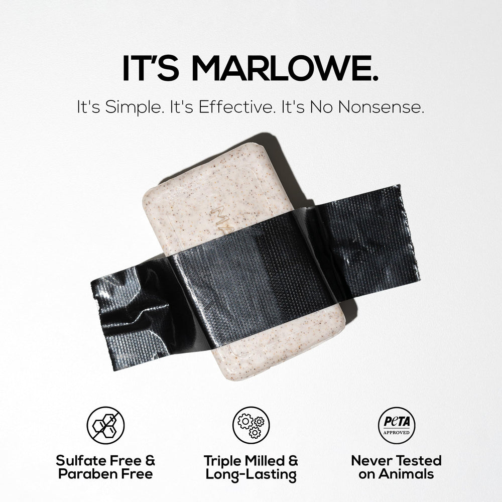 MARLOWE. 7 oz bar beside a hand for scale demonstrating large size benefit